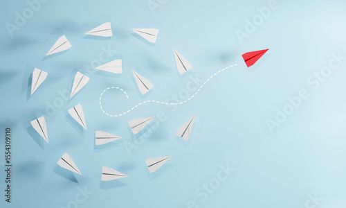 Red paper plane flying away from a group of white planes on blue background. Concept of leadership, innovation, individuality, thinking different, and unique direction.