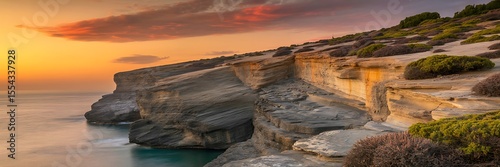 Serene sunset photo of Andalusian cliffs and Mediterranean vegetation  
