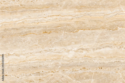 Old brown stone wall with a rough, grunge texture perfect for vintage backgrounds and antique designs