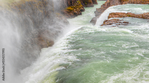 Panoramic view of Gullfoss waterfall on the Hvíta river, a popular tourist attraction and part of the Golden Circle Tourist Route in Southwest Iceland photo
