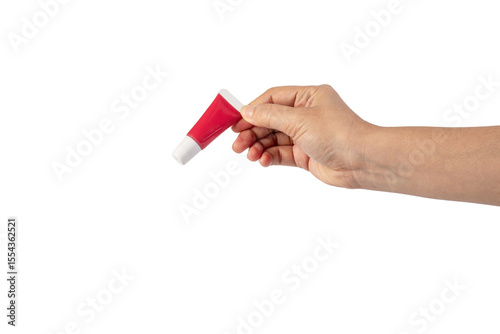 Red lipstick, small tube, and empty space and hand on transparent background.