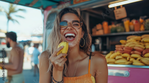 Young Woman Enjoying snack at Food Truck Market