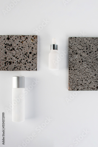 Plastic white tube for cream or lotion. Skin care or sunscreen cosmetic, Cosmetic accessory for makeup with stylish props on white background.