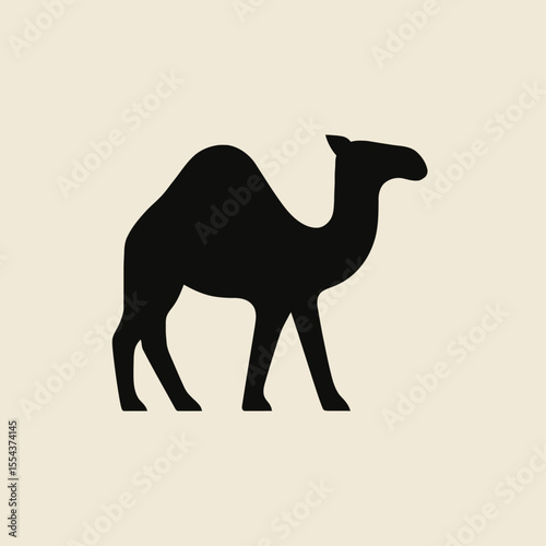Black silhouette of a camel standing against a beige background