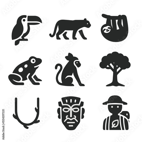Rainforest Animal Icons. Solid, filled icons set of rainforest animals: toucan, jaguar, sloth, poison frog,