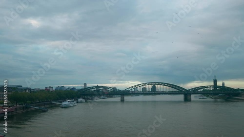 Wallpaper Mural View from Deutzer Brucke of Hohenzollern railway bridge with dramatic cloudscape in Cologne, Germany. Torontodigital.ca