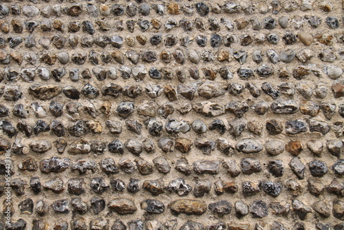 The Stones of a Traditional Flintstone House Wall.