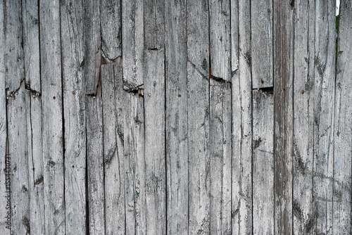 Background of an old faded wooden fence