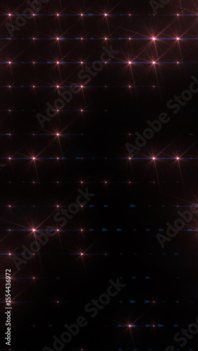 Grid of glowing pink lights in a dark space forming an abstract, high-tech network pattern