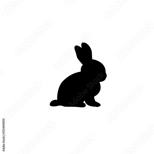 A black silhouette of a rabbit sitting upright in a relaxed pose on a white background.
