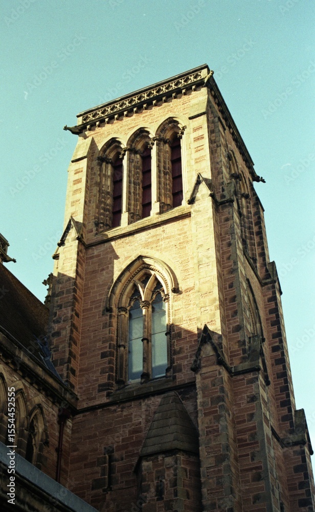 Fototapeta premium church tower in sunlight
