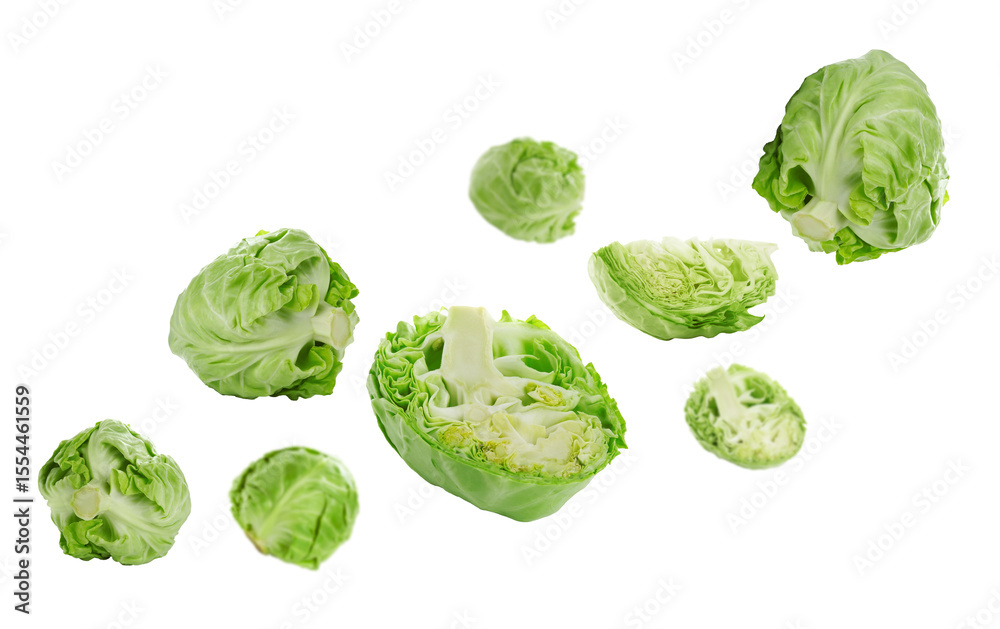 Fototapeta premium Fresh ripe cabbages falling on white background