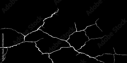 Generate an image depicting a high-contrast texture of a surface with luminous, branching cracks against a deep, dark, or black background. The cracks should appear to glow or be brightly highlighted.