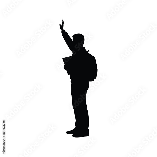 Silhouette of a student with backpack hailing a taxi or a ride