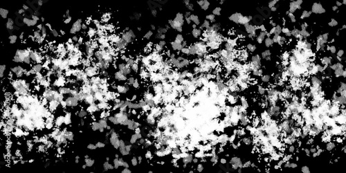 Snowflakes on dark background. white icy snowflakes isolated on black background, natural background. white crystalline powder on a black background. sugar dust. texture, pattern and clipping.