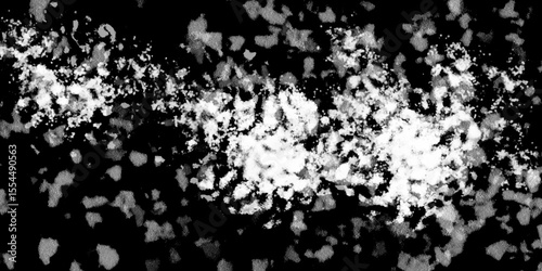 Snowflakes on dark background. white icy snowflakes isolated on black background, natural background. white crystalline powder on a black background. sugar dust. texture, pattern and clipping.