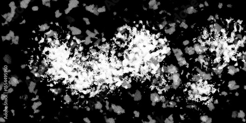 Snowflakes on dark background. white icy snowflakes isolated on black background, natural background. white crystalline powder on a black background. sugar dust. texture, pattern and clipping.