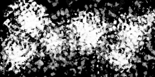 Snowflakes on dark background. white icy snowflakes isolated on black background, natural background. white crystalline powder on a black background. sugar dust. texture, pattern and clipping.
