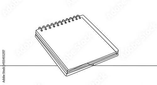 Blank sketchbook on wooden table
