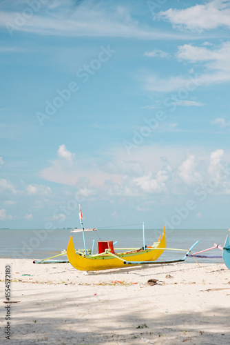 yellow traditional indonesian fishing boat