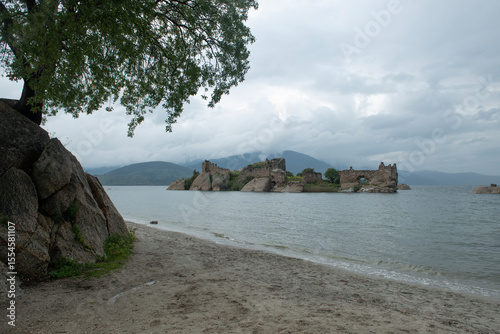 Fototapeta Naklejka Na Ścianę i Meble -  Kapıkırı, Muğla, Turkey; Herakleia Ancient City or Latmos Herakleia in Lake Bafa is one of the urban settlements of the Ancient Ionian region. Fishing boats in Lake Bafa.