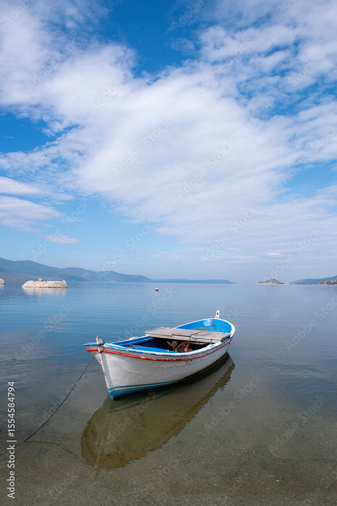 Kapıkırı, Muğla, Turkey; Herakleia Ancient City or Latmos Herakleia in Lake Bafa is one of the urban settlements of the Ancient Ionian region. Fishing boats in Lake Bafa. Kapıkırı, Muğla, Turkey; Herakleia Ancient City or Latmos Herakleia in Lake Bafa is one of the urban settlements of the Ancient Ionian region. Fishing boats in Lake Bafa.