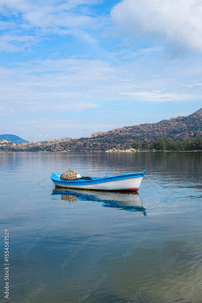 Kapıkırı, Muğla, Turkey; Herakleia Ancient City or Latmos Herakleia in Lake Bafa is one of the urban settlements of the Ancient Ionian region. Fishing boats in Lake Bafa. Kapıkırı, Muğla, Turkey; Herakleia Ancient City or Latmos Herakleia in Lake Bafa is one of the urban settlements of the Ancient Ionian region. Fishing boats in Lake Bafa.