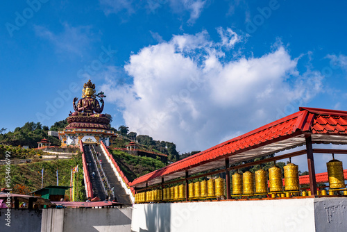 The beautiful and world's tallest statue of Chenrezig in the Pelling, West Sikkim, India.  View of A Huge metallic statue of Chenrezig at Sangha Choeling.