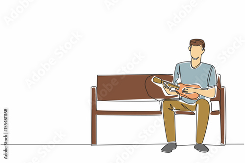 Single one line drawing a man sitting on park bench plays the ukulele. Hobby playing musical instruments. Singing anywhere. National Play Your Ukulele Day. Continuous line design graphic illustration