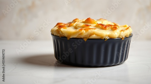 Piping hot shepherd’s pie with steam rising from the mashed potato topping