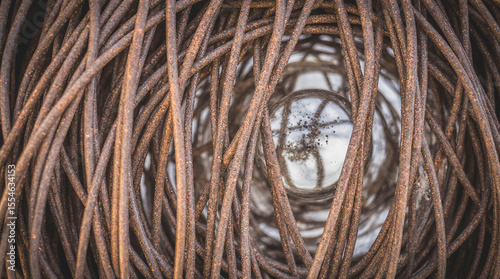  Macro and Close-Up Shot of Rusted Metal Wire Covered in Dew Drops Reflecting Distorted Miniature Worlds, Featuring Highly Detailed Textures and a Poetic Industrial Mood