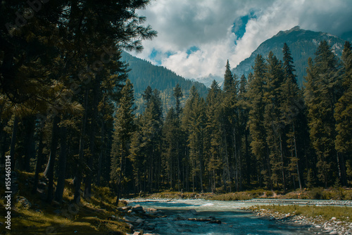 Kumrat valley deep jungle and river and snowy mountains