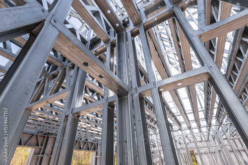 Steel frame commercial building under construction. The steel girder framework of a new building