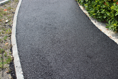 Aménagement de route, allée, trottoir, travaux de voirie, bordure et enrobé