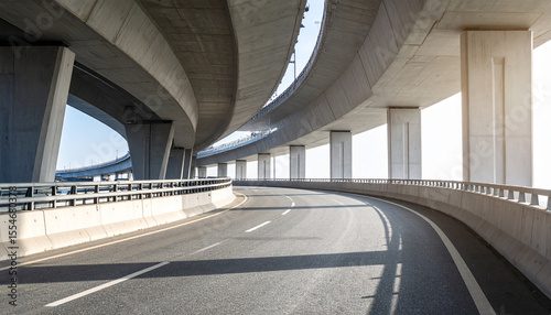 Highway Underpass: Capturing the dynamic architecture of a modern highway underpass, this image showcases the graceful curves of the road as it weaves beneath the concrete structure.