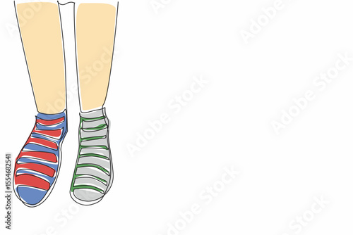 Single one line drawing different stripes between right and left. Comfort comes first, differences are a matter of taste. Colorful socks. Anti Bullying Day. Continuous line design graphic illustration