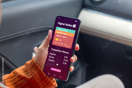Woman using digital wallet on her smartphone to pay online