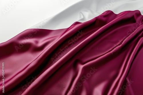 Close up of waving fabric with maroon and white color flag of latvia on isolated background, detailed photo