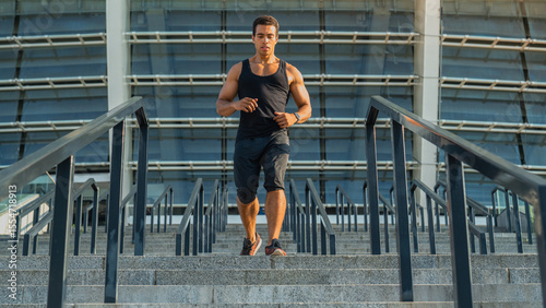 Fitness, health and city man running on street with motivation, healthy mindset and summer morning energy for training. Urban workout, cardio exercise and runner on bridge, focus on sports lifestyle.