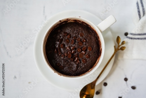 One minute microwave brownie | chocolate cake in a mug, selective focus