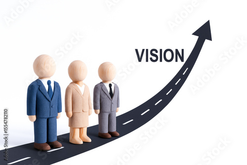 Three wooden figurines dressed in business attire standing on road with upward arrow and word VISION, symbolizing growth and leadership in concept of progress and strategic planning