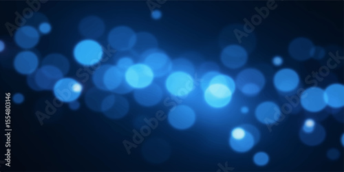 Abstract blue background with glowing defocused lights and bright bokeh circles for a festive holiday design
