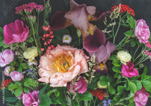 Fotografie Vibrant Flower Bouquet with Irises and Roses
