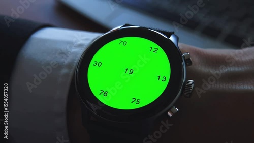 Checking Time on Smartwatch with Green Screen for Customization Close Up