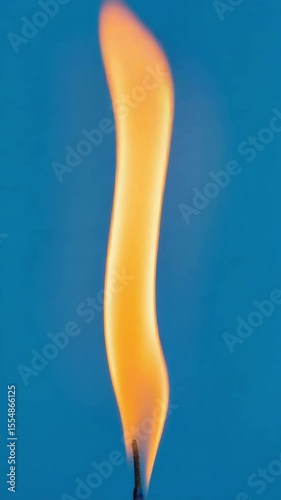 Gentle, minimal candle flame animation flickering with warm light, perfect as a calming background for relaxation or meditation.