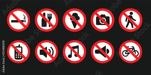 Collection of common prohibition signs with black icons on a dark background