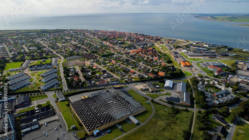 Fototapeta Naklejka Na Ścianę i Meble -  Arial panoramic view of the old town of the coast city Logstor in Denmark on a sunny spring day


