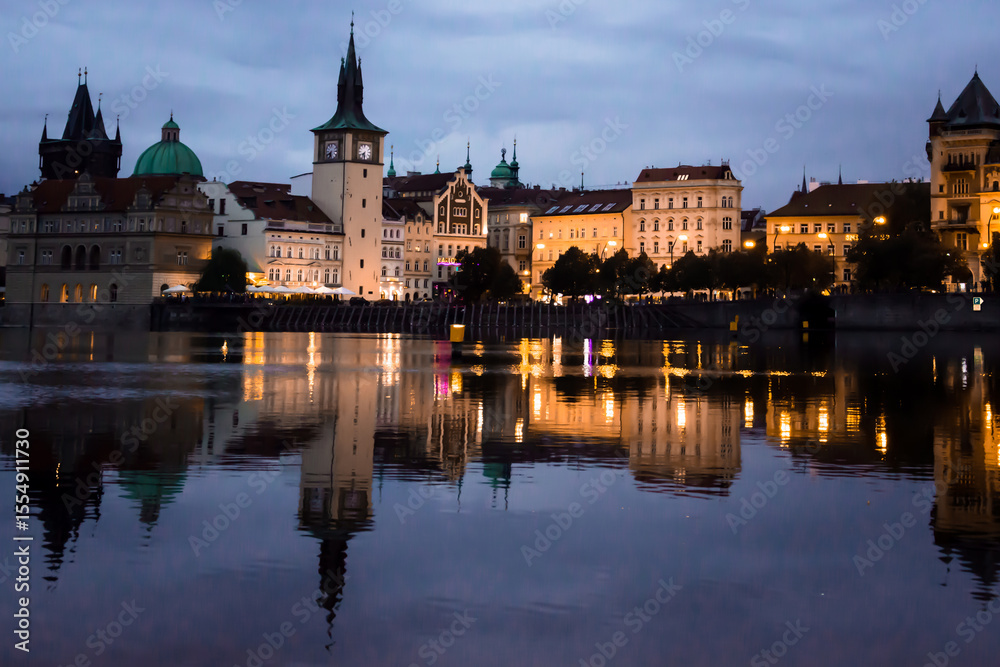 Naklejka premium Night View of Prague Old Town with Reflections on Vltava River