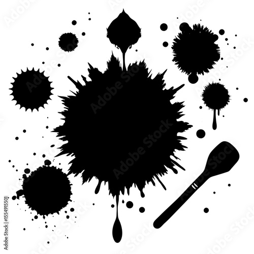 Black ink splatters and drops with a spoon on a white background