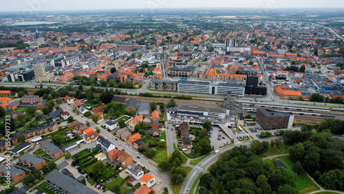 Fototapeta Naklejka Na Ścianę i Meble -  An arial panoramic view of the old town of the city Herning in Denmark on a cloudy spring day